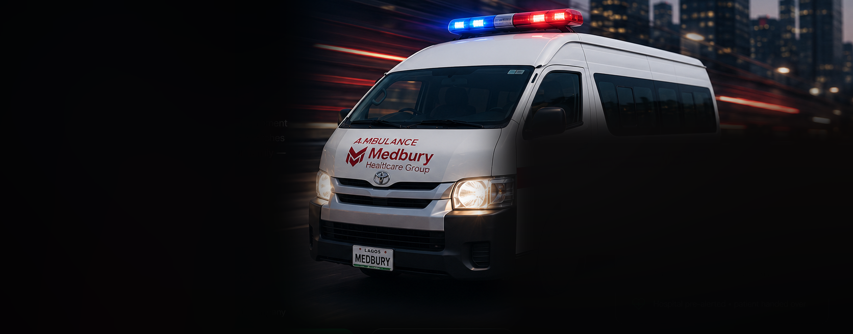 Medbury Healthcare Group ambulance responding through city streets at night